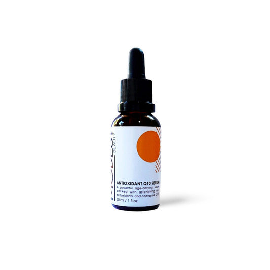 A small brown bottle with a dropper cap, labeled "Antioxidant Q10 Serum" by Modest Beauty. The label features an orange circle design and text indicating the age-defying serum has anti-aging properties, is enriched with antioxidants and bakuchiol, and contains 30 ml (1 fl. oz) of product.