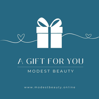 A graphic with a blue background features a white gift box with a bow at the top. The text below reads "Gift Voucher" and "Modest Beauty," followed by the website URL "www.modestbeauty.online." Two minimalist heart icons connected by a single line adorn the sides, hinting at personalized indulgence.